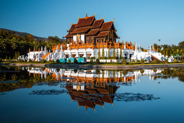 Royal Park Rajapruek, botanical garden and pavilion in Chiang Mai, Thailand Royal Park Rajapruek. Landscaped grounds featuring flowers, plants and sculptures, plus an elegant commemorative chapel. chiang mai city stock pictures, royalty-free photos & images