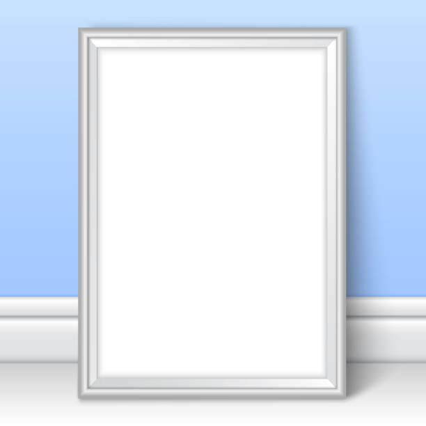 istock Photoframe template near blue wall. Realistic mockup vector. Silver framing great for kids drawing, painting or photo. Picture template for children room or school theme design. 1389879978