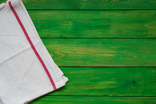 Kitchen towel or napkin over the wooden table