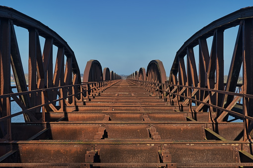 old rusty steel railway bridge with arches in dömitz germany