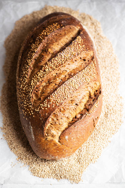 istock Artisanal sourdough bread with sesame seeds. Close up. 1389884508