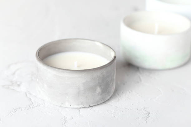 Candle with natural soy wax. A candle in a plaster mold. Interior candle. Creating comfort.
