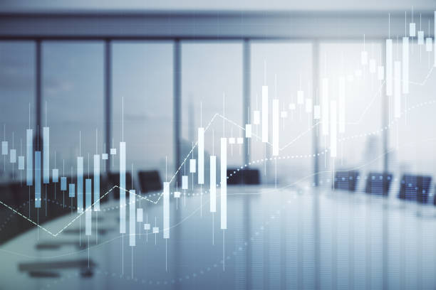 istock Abstract virtual financial graph hologram on a modern furnished classroom background, financial and trading concept. Multiexposure 1389885617