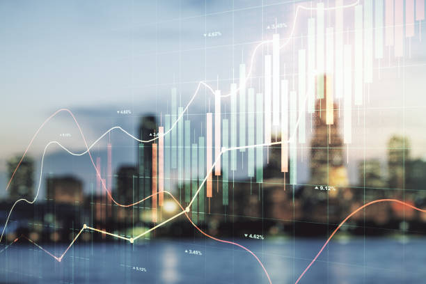 istock Abstract virtual financial graph hologram on blurry skyscrapers background, financial and trading concept. Multiexposure 1389885667