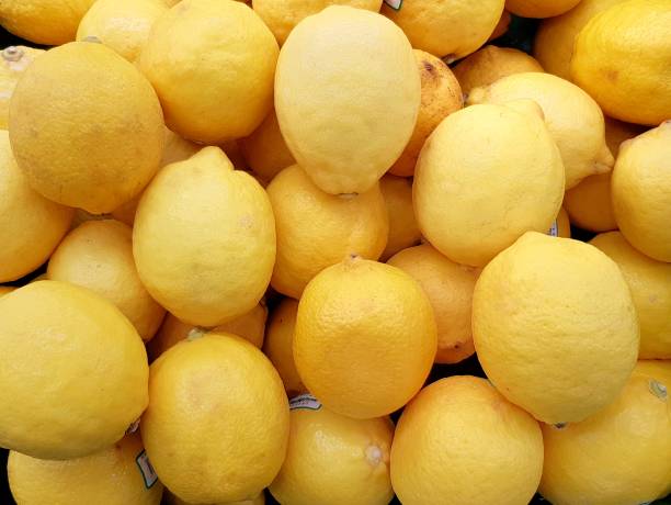 istock Background of lemons. 1389888854