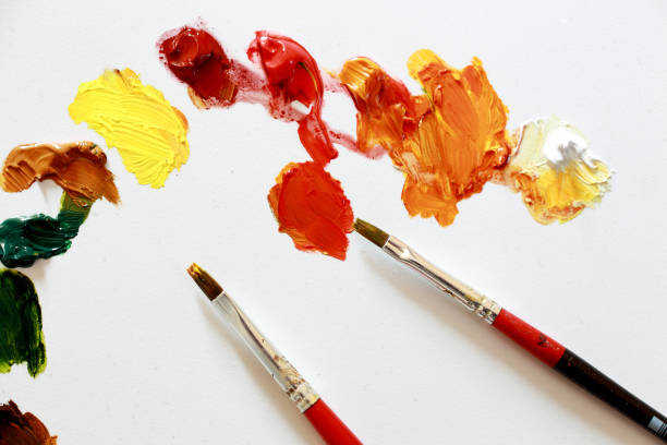 istock multicolor paint on palettes to create paintings 1389888890