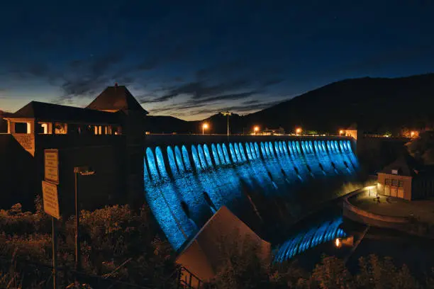 Illuminated dam wall at the Edersee in Hesse Germany
