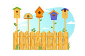 istock Wooden multi-colored birdhouses 1389893972