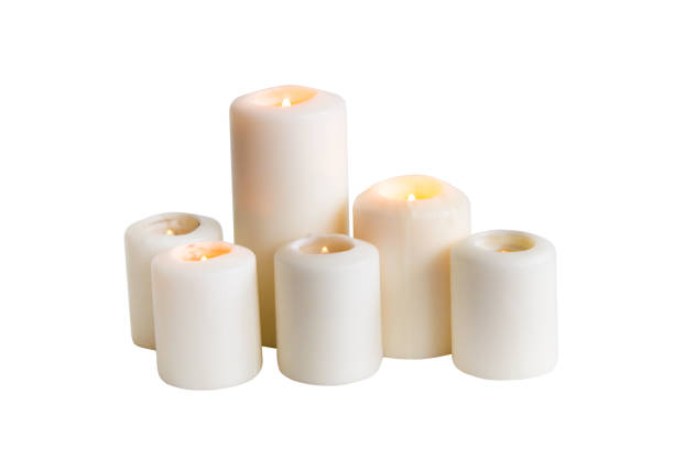 istock White candle isolated on a white background 1389899590