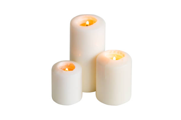 istock White candle isolated on a white background 1389899637