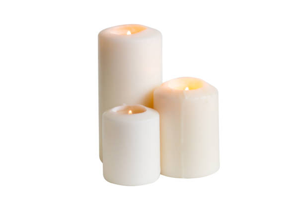 istock White candle isolated on a white background 1389899659