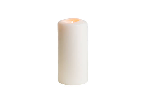 White candle isolated on a white background stock photo