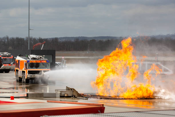 istock Airport crash tender during a fire drill 1389902445