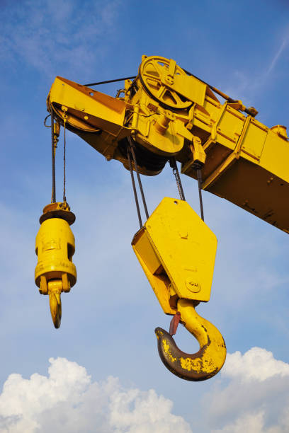istock Yellow crane with blue sky backgorund, Low angle view 1389906937