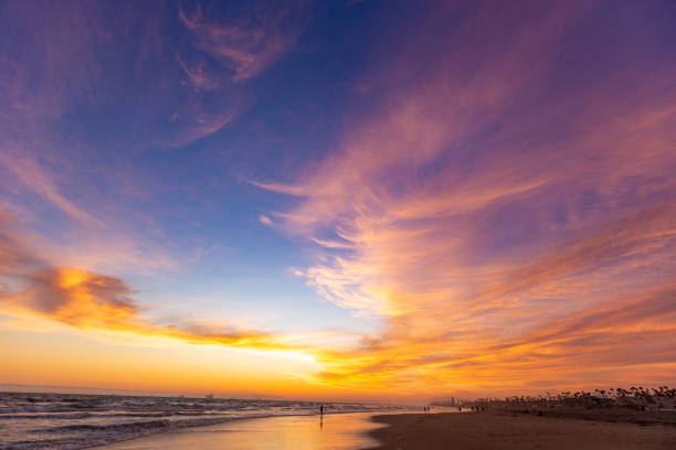 istock Dramatic colorful sunset at Huntington Beach, California 1389909089