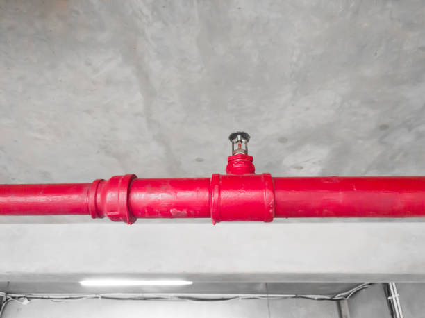 istock An old fire sprinkler (Sprinkler Upright) in the room. Red fire sprinkler. 1389909098