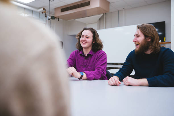 istock Group of Engineering Student Brainstorming New Project Ideas with Professors 1389914128