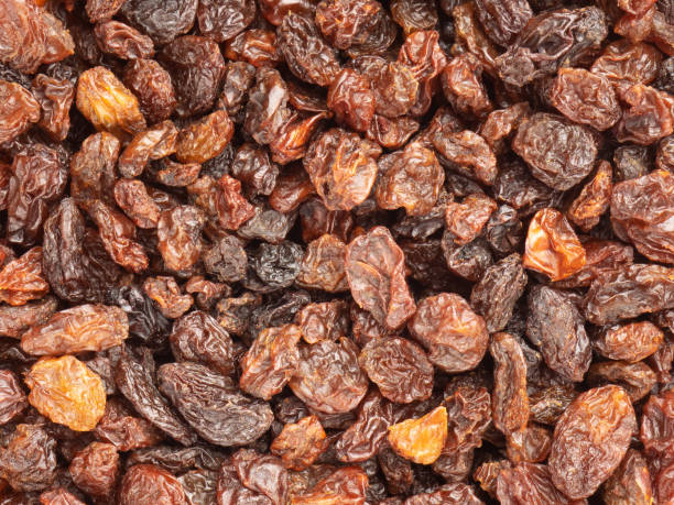 istock Raisin background. Macro. Flat lay. Healthy food concept 1389915425