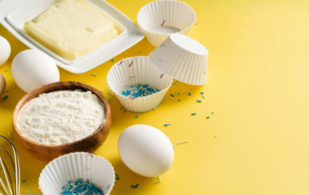 istock Ingredients and molds for baking cupcakes and muffins. 1389915562