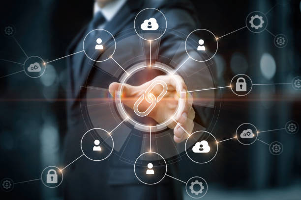 istock Businessman clicks on a web link in a network of connections . 1389917117