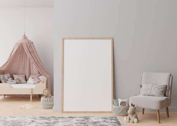 istock Empty vertical picture frame standing on the floor in modern child room. Mock up interior in scandinavian style. Free, copy space for your picture. Bed, rattan basket. Cozy room for kids. 3D rendering 1389927379