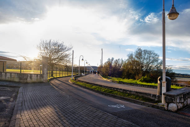 istock Walking path in the park at sunset 1389931845