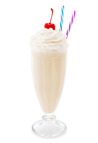 Vanilla milkshake with cherry and two colorful straws isolated on white background