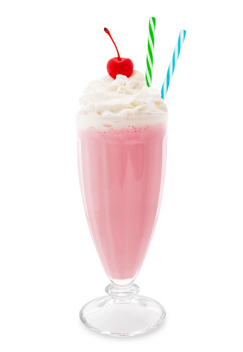 Strawberry milkshake with cherry and two colorful straws isolated on white background