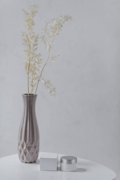 istock original vase with decor on a white table and background. jar and box 1389934405