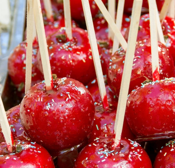 istock Close up, Red candied apples as background 1389935594