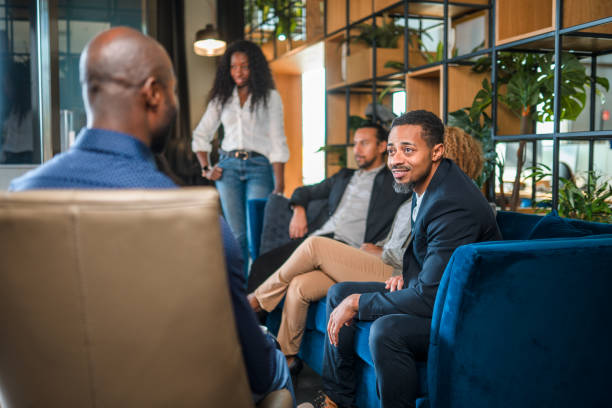istock Diverse Business Associates Casually Hanging Out in A Modern Office 1389936016