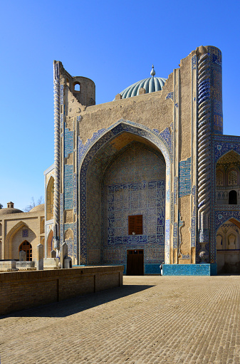 Balkh, Balkh province, Afghanistan: Green Mosque - 15th century Timurid Architecture, built by the ruler of the Eastern Timurid Empire, Shah Rukh - pishtaq façade with tilework with quranic calligraphy and vaulted iwan - Khwaja Abu Nasr Parsa was a sheikh of the Naqshbandiya Sufi order and stood in the spiritual tradition of his father Khwaja Muhammad Parsa († 1420), from whom the spiritual chain of descent (silsila) went through Ala ad-Din Attar († 1399) to the founder of the order, Baha-ud-Din Naqshband (1318-1389). Masjid Sabz