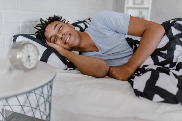 istock Young African American man is sleeping 1389937761