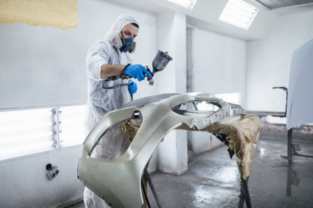 istock Car painting 1389939244
