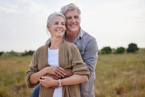 Shot of a mature couple standing together on a farm What a beautiful life we've built for ourselves the farmer and his wife pictures stock pictures, royalty-free photos & images