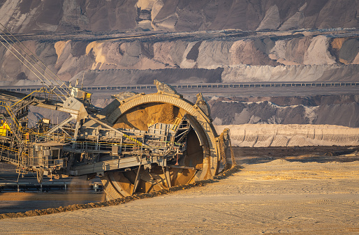 Close up of enormous bucket wheel excavator in an open pit lignite mine