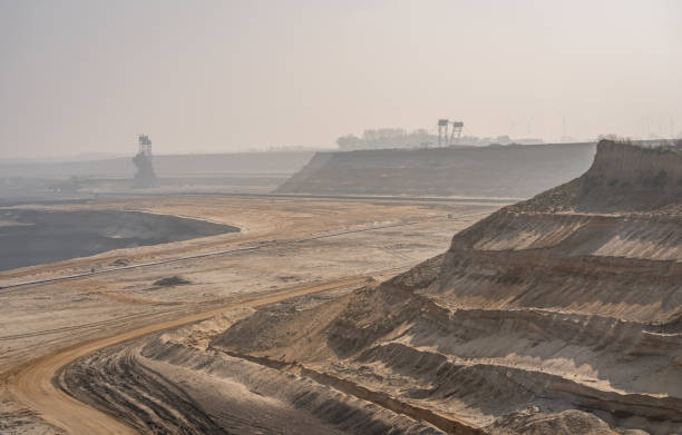 istock Barren landscape of Garzweiler surface mine, view into the open mine pit 1389941950