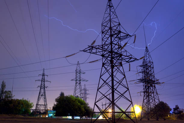 istock Power transmission lines being struck by lightning during the night thunderstorm 1389944057