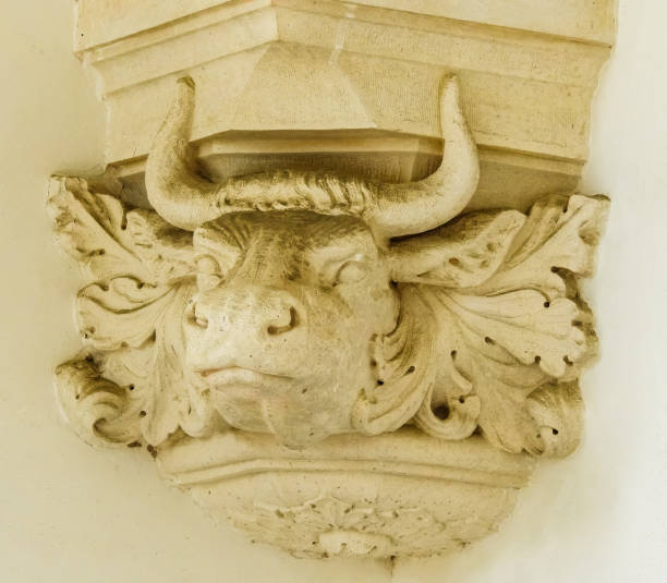 Sintra, Portugal - July 27 2019: Quinta da Regaleira Palace stables architectural features - sculpture of bull head