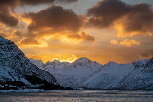 view of a bay at sunrise in winter at lofoten isalnds - Norway