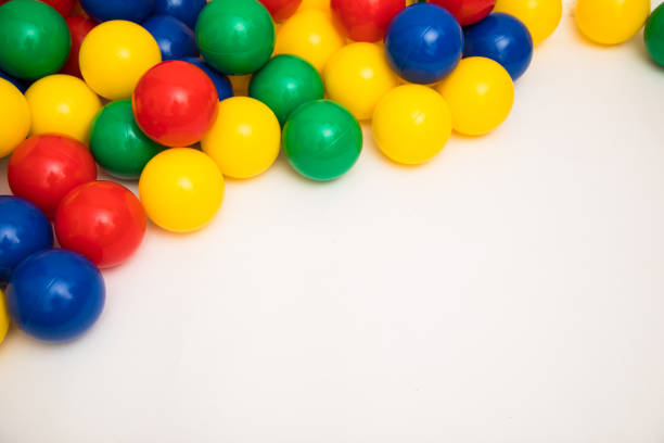istock Multi-colored plastic balls. A children's balls isolated on white background. 1389948962