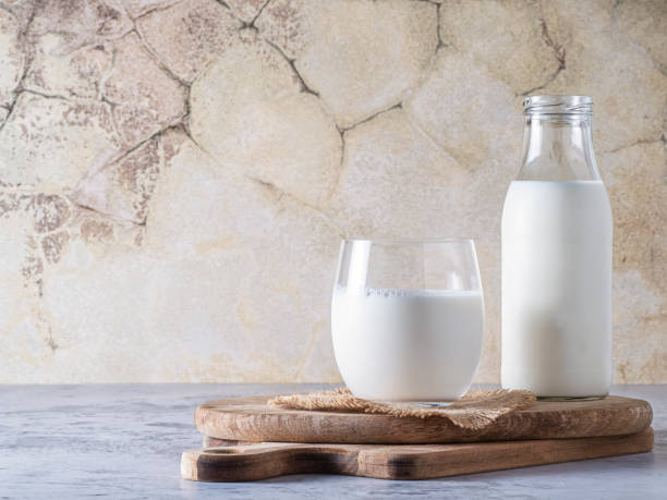 Bottle and glass with milk