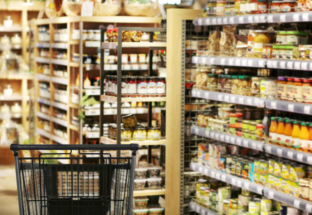 istock empty grocery cart in an empty supermarket 1389954103