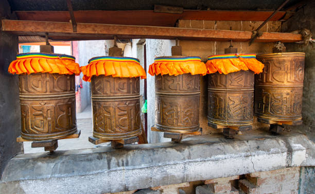 istock Colorful Buddhist prayer wheels in Amdo, Eastern Tibet 1389954661