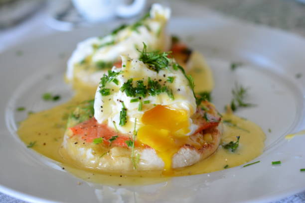 istock Close up of Eggs Benedict with runny egg yolk 1389956227