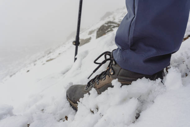 istock Man walk in the winter in the snow 1389957094