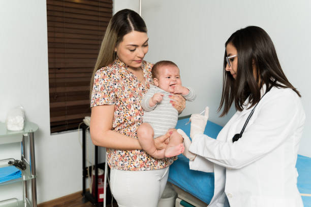 istock Baby getting a vaccine shot 1389958035