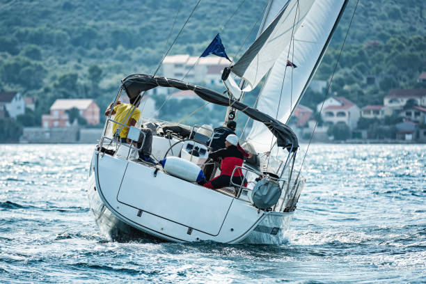 istock Sailing crew on sailboat during regatta 1389962430