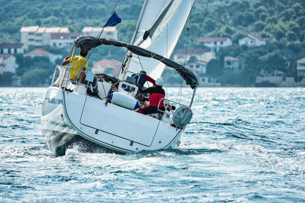 istock Sailing crew on sailboat during regatta 1389962434