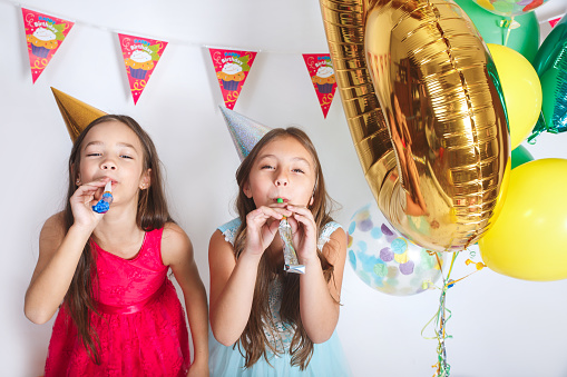 Group of kids celebrate birthday party together and having fun